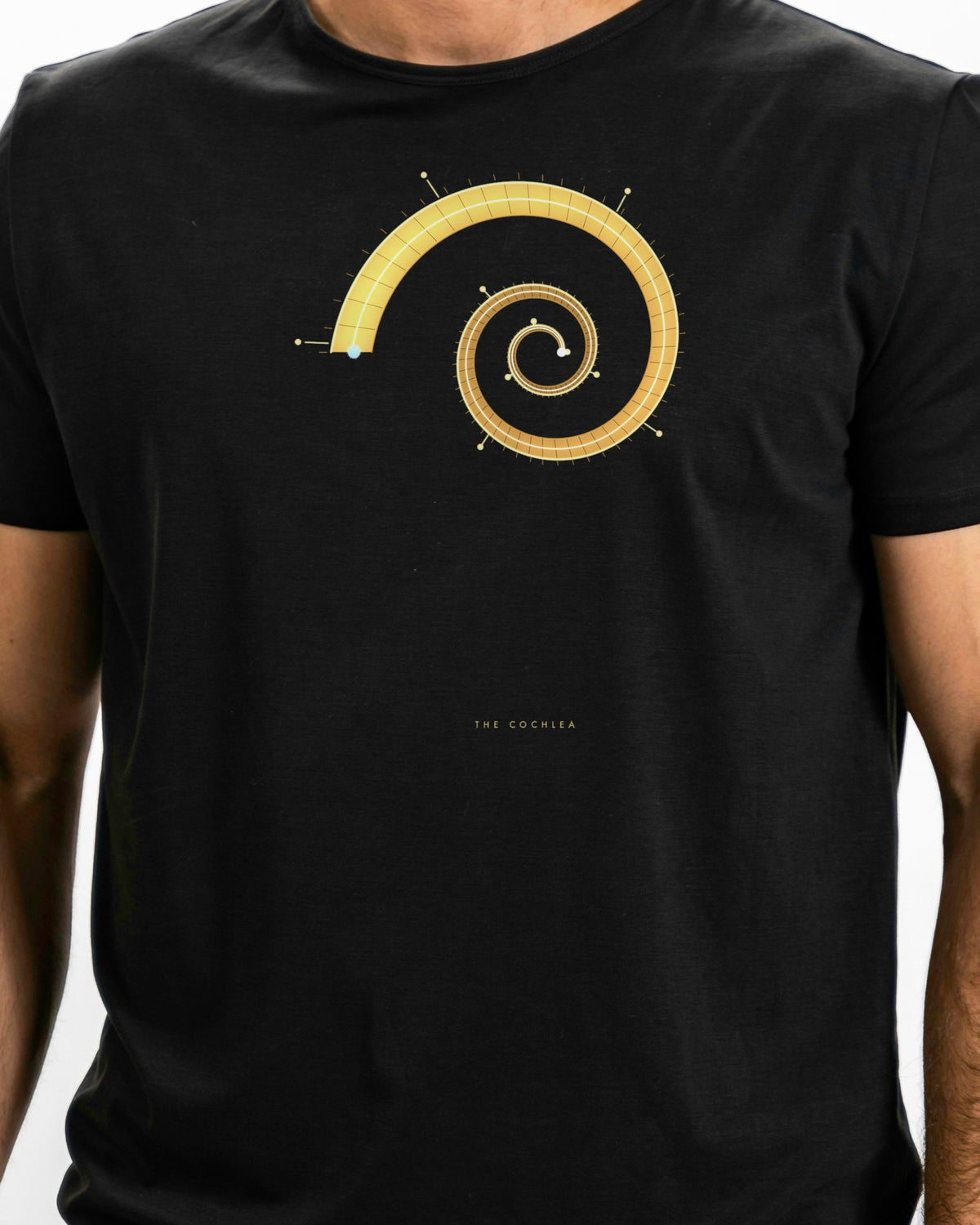 Model photo of the The Cochlea Tee: illustrative, print shown at actual size