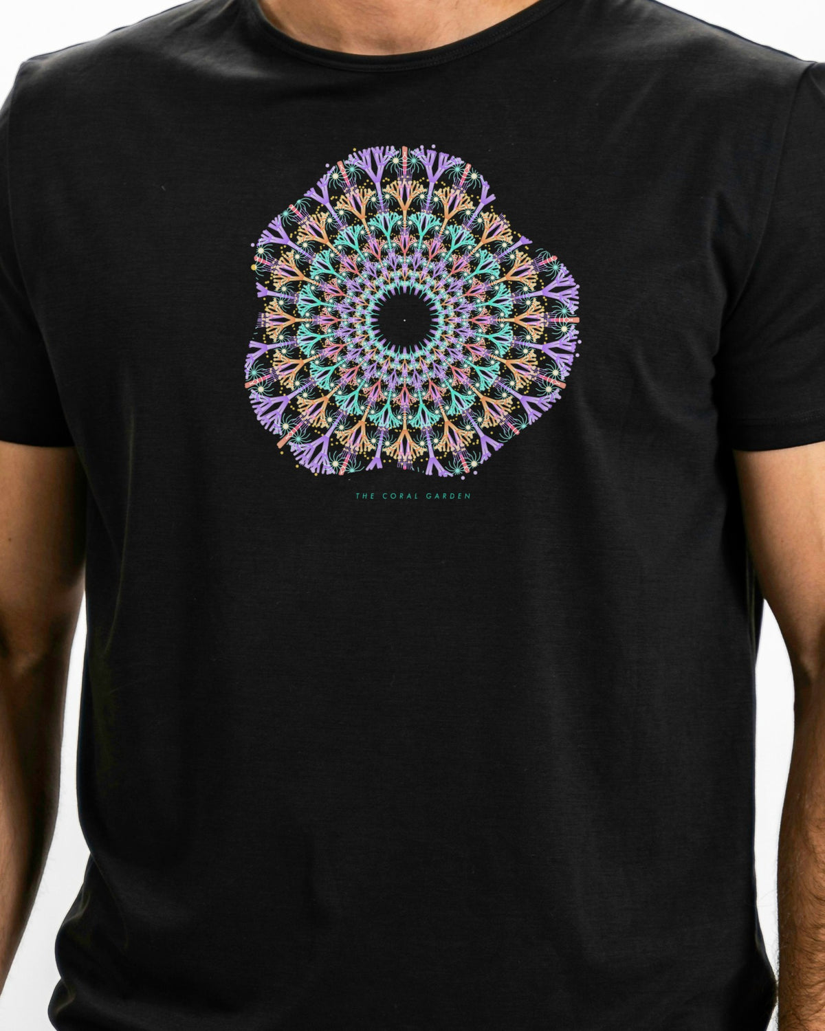 Model photo of the The Coral Garden Tee: illustrative, print shown at actual size