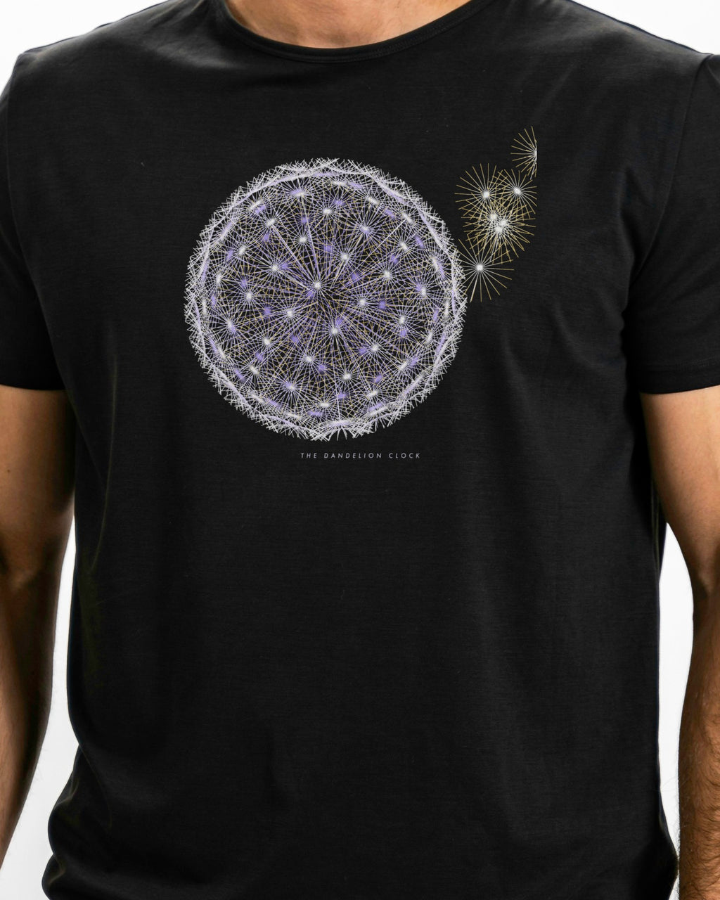 Model photo of the The Dandelion Clock Tee: illustrative, print shown at actual size