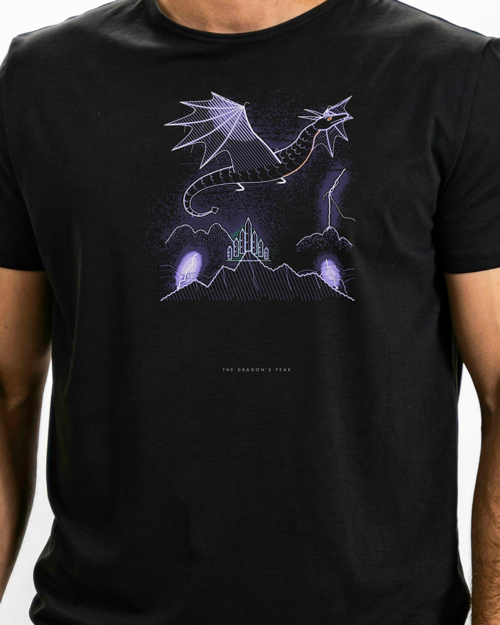 Model photo of the The Dragon's Peak Tee: illustrative, print shown at actual size