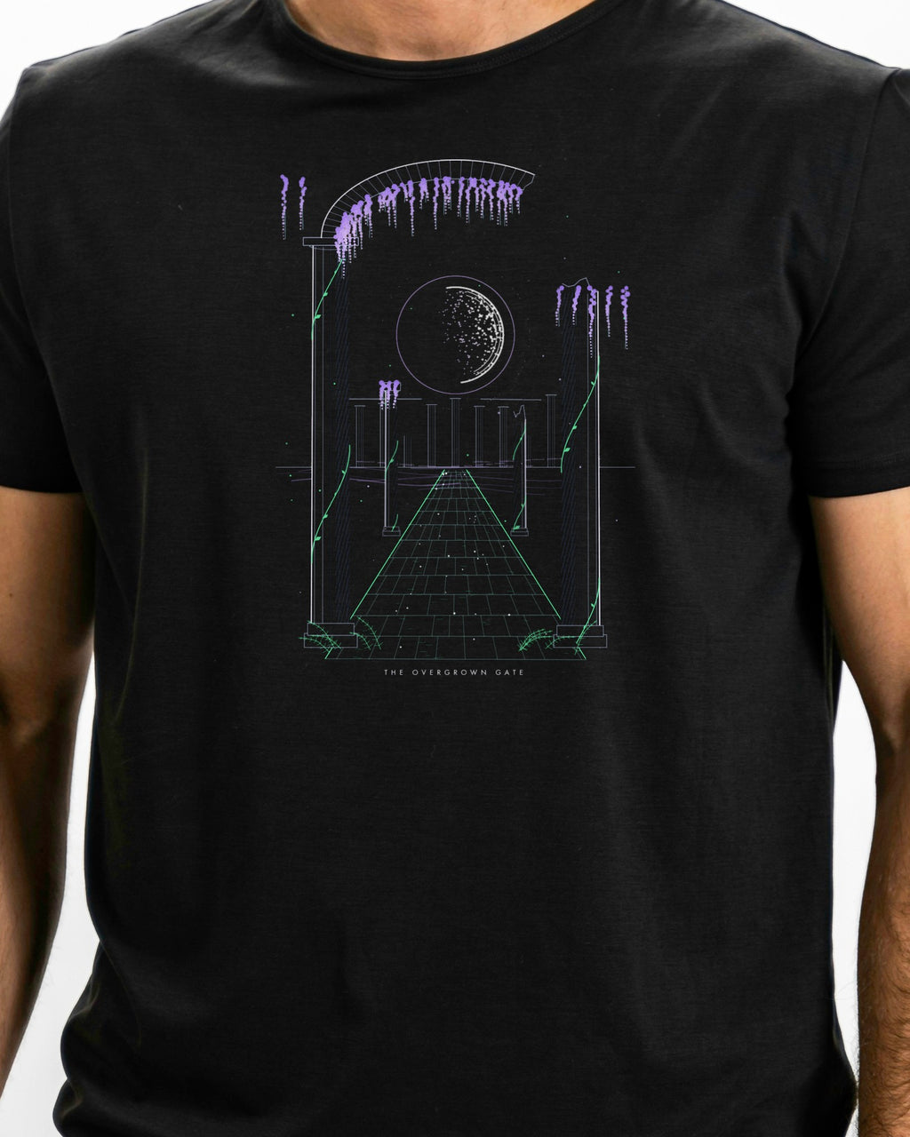 Model photo of the The Overgrown Gate Tee: illustrative, print shown at actual size