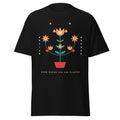 Folk Bloom graphic tee in Black, original art by AuraCanvas