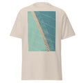 Chesil Beach graphic tee in Natural, original art by AuraCanvas