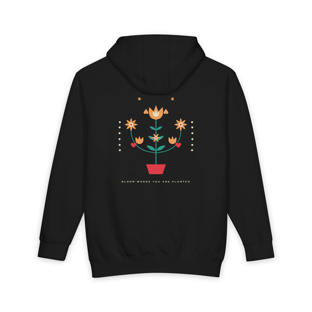 Folk Bloom heavyweight hoodie in Black, original art by AuraCanvas